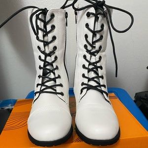 Brand new white boots. Never worn. Size 8.